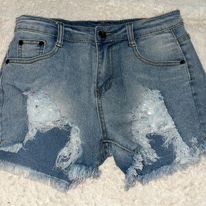Blue denim distressed shorts